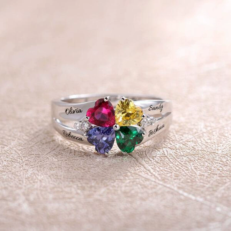 Engraved family name ring with four colored birthstones