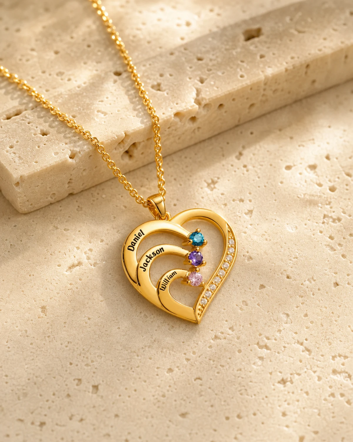 Personalized family heart necklace with engraved names and birthstones