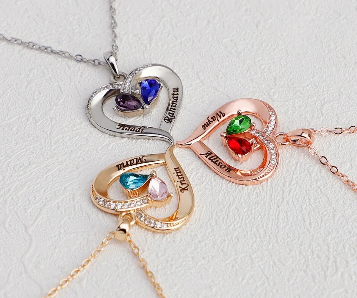 Two-tone teardrop necklace shown in stainless-steel, rose-gold, and gold-tone options