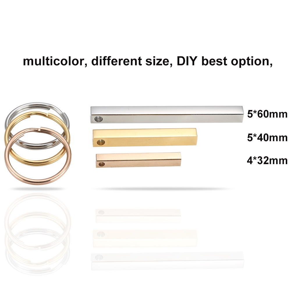 Polished stainless steel bar keychain engraved with a name and a small birthstone