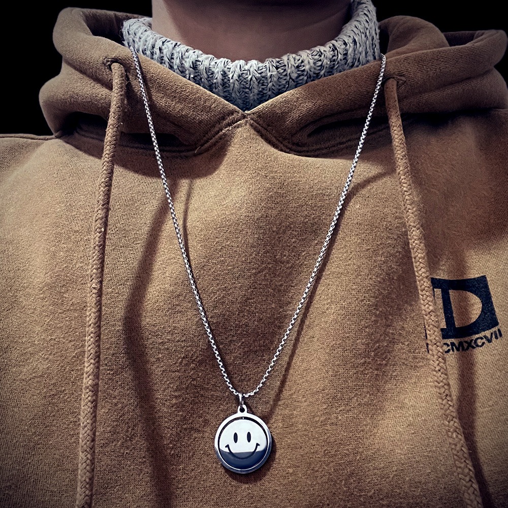 Rotating smile pendant necklace with a photo print
