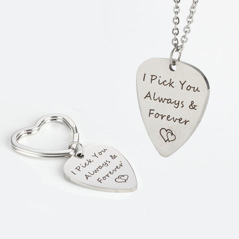 Stainless steel guitar pick necklace engraved with a name and a birthstone accent