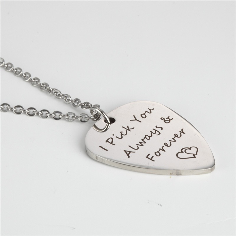 Stainless steel guitar pick necklace engraved with a name and a birthstone accent