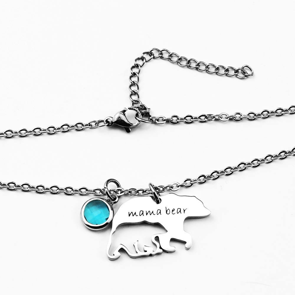 Hollow mama bear pendant necklace in stainless steel with a custom engraved name and birthstone accent