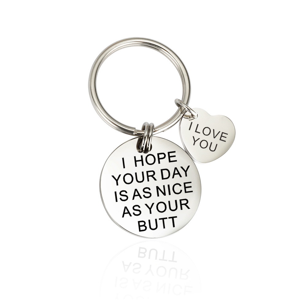 Stainless steel keychain with custom engraving and a birthstone charm