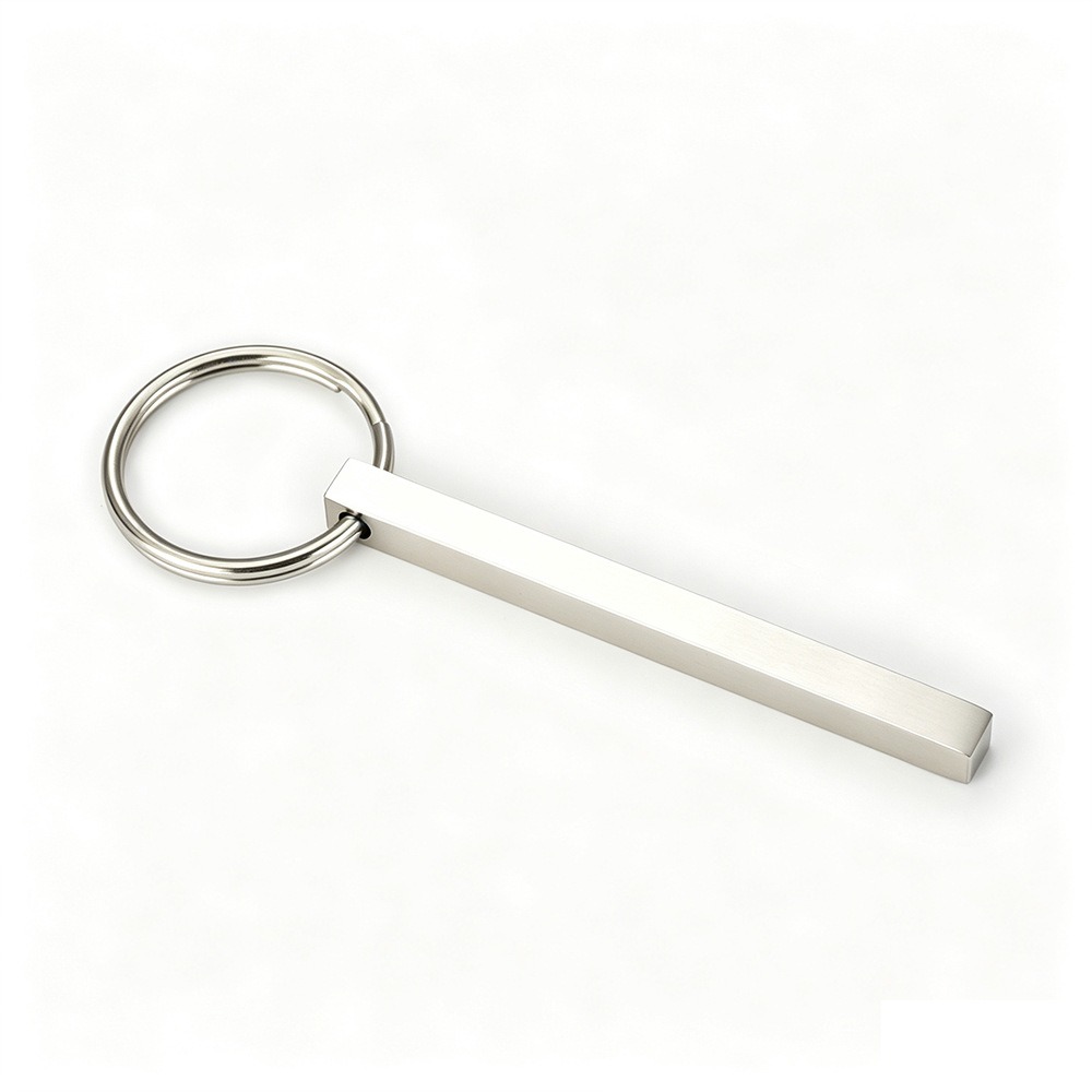 Polished stainless steel bar keychain engraved with a name and set with a single birthstone — Silver Tone