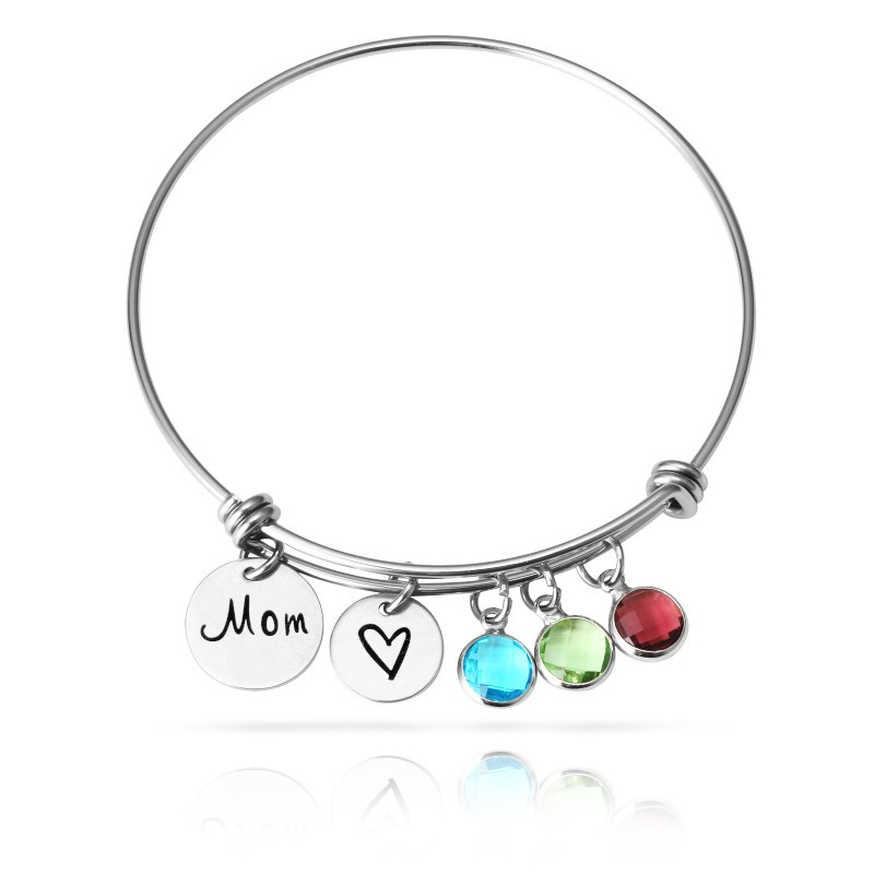 Stainless steel bracelet engraved with a name and set with a single birthstone