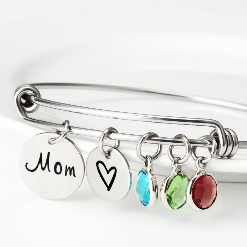 Stainless steel bracelet engraved with a name and set with a single birthstone