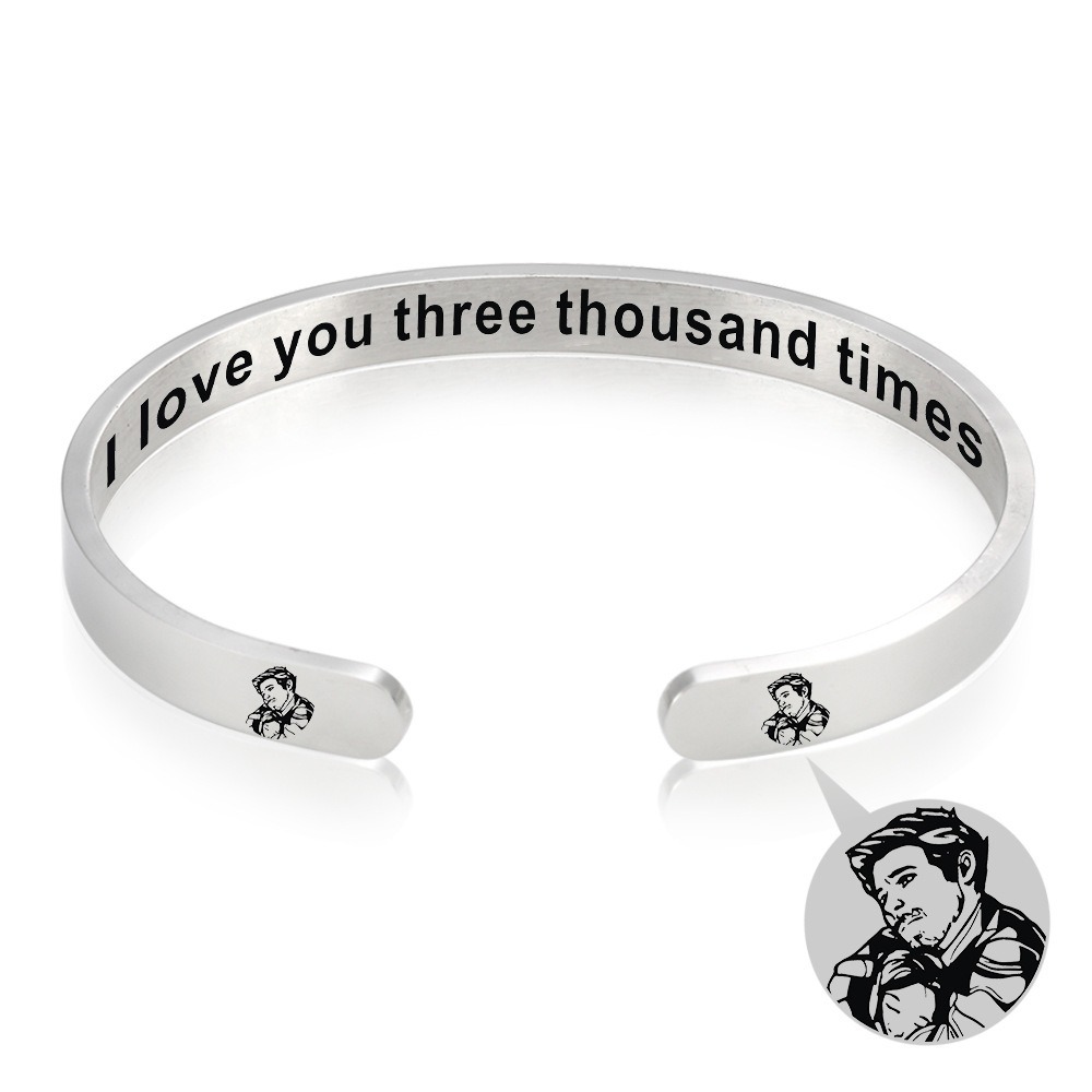 Stainless steel open cuff bracelet engraved with a name and a single birthstone