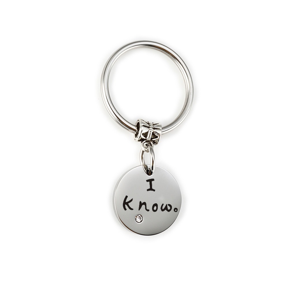 Stainless steel couple set with two engraved heart pendants, birthstones and a coil keychain