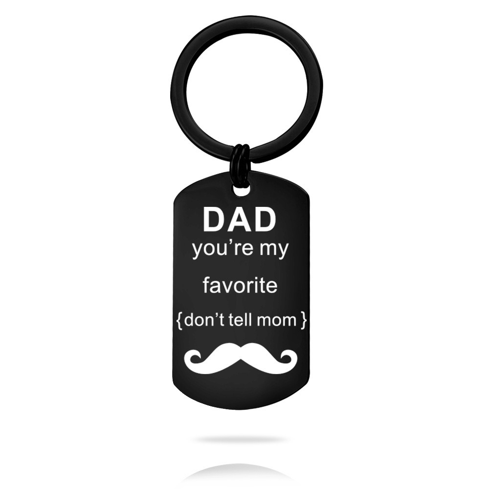 Engraved stainless steel dog tag keychain with a single birthstone accent