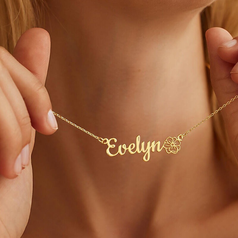 Custom stainless steel name necklace with single line cut name and small birthstone accent