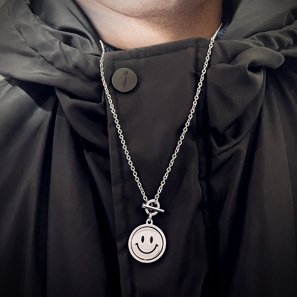 Rotating smile pendant necklace with a photo print