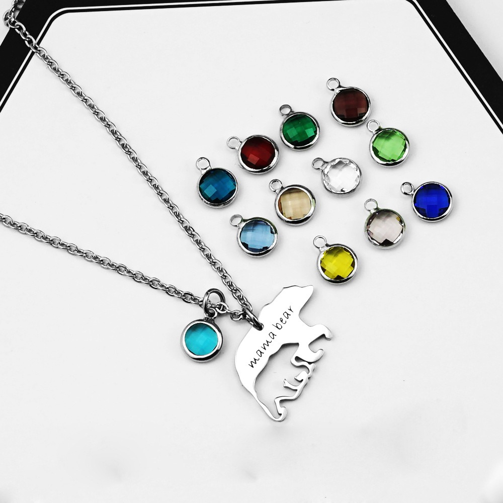 Hollow mama bear pendant necklace in stainless steel with a custom engraved name and birthstone accent