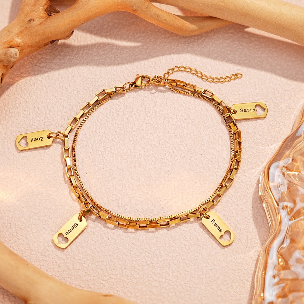 Open heart charm bracelet with engraved heart and birthstone on a two-layer chain