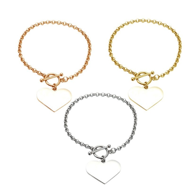 Double sided photo heart bracelet with engraved message in rose gold