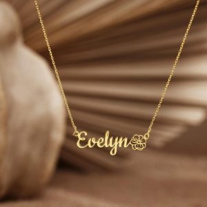Custom stainless steel name necklace with single line cut name and small birthstone accent