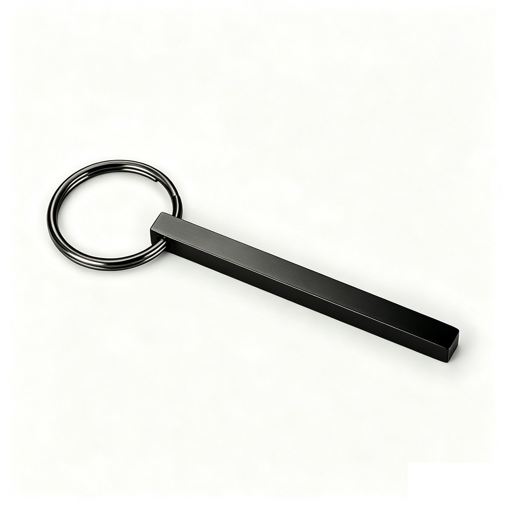 Polished stainless steel bar keychain engraved with a name and set with a single birthstone — Black Tone