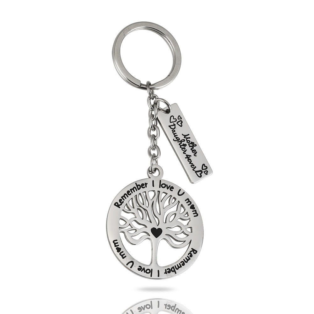 Steel life tree keychain with a single line of engraved text and one birthstone charm