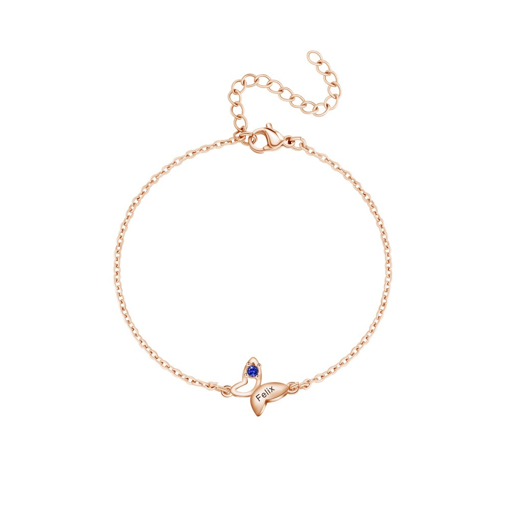 Butterfly bracelet with an engraved name and birthstone accent in gold tone — Rose Gold Tone