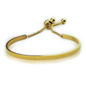 4mm engraved stainless steel cuff bangle with a birthstone, worn on a wrist — Gold Tone