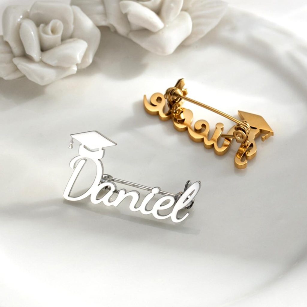 Stainless steel graduation cap brooch with custom name engraving and a birthstone accent