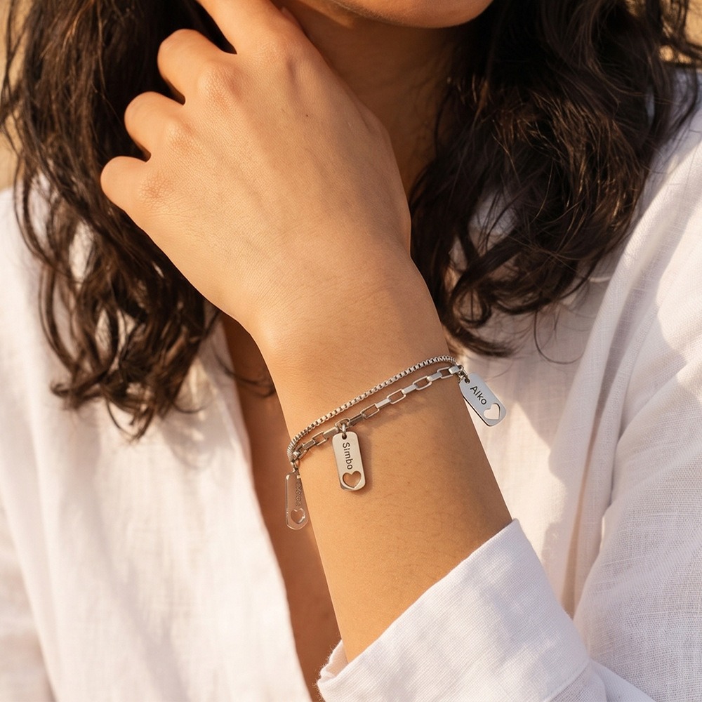 Open heart charm bracelet with engraved heart and birthstone on a two-layer chain
