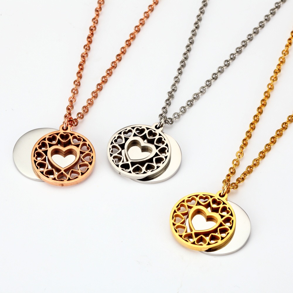 Open heart pendant necklace with a name engraved inside and a small birthstone charm