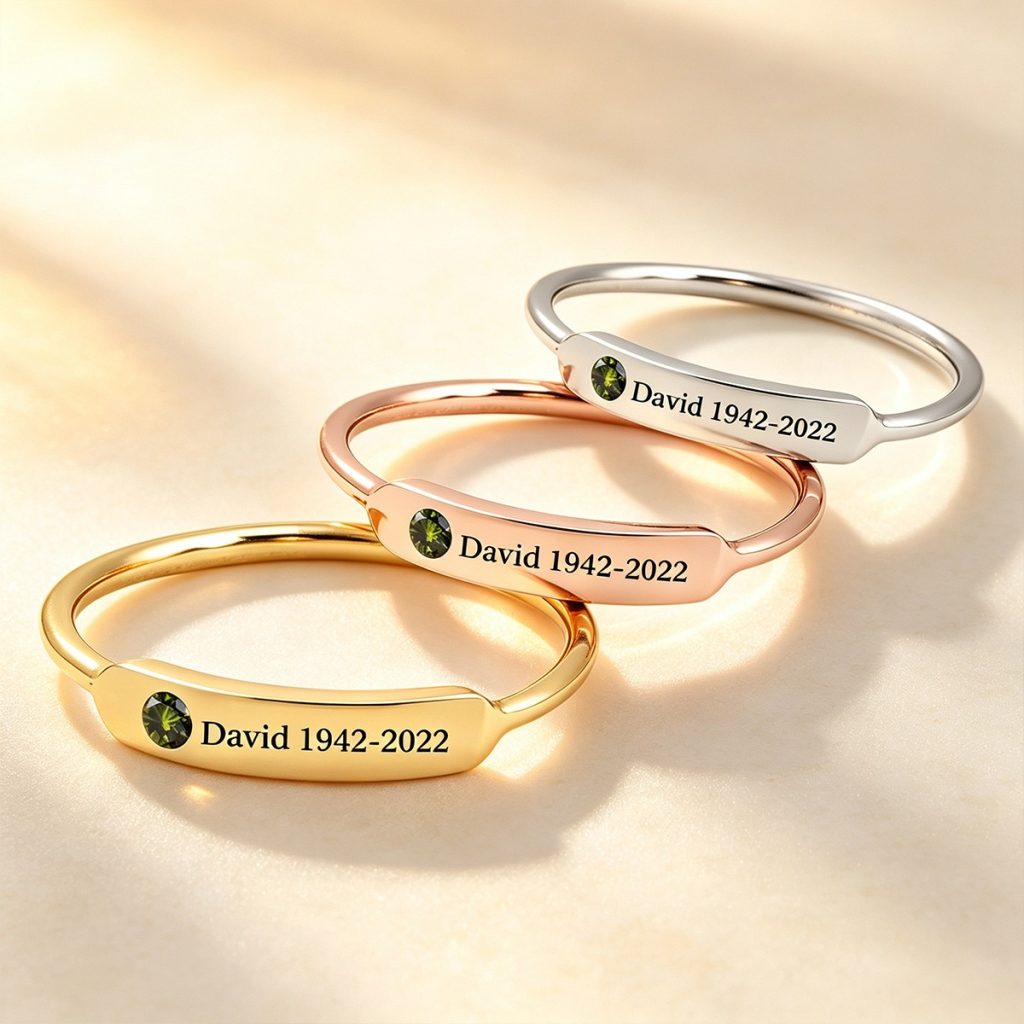 Minimalist stainless steel ring with cubic zirconia accent and one line of engraving