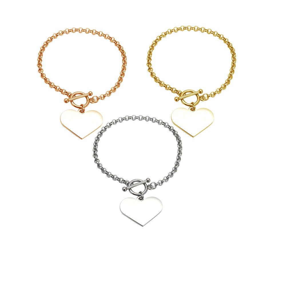 Double sided photo heart bracelet with engraved message in rose gold