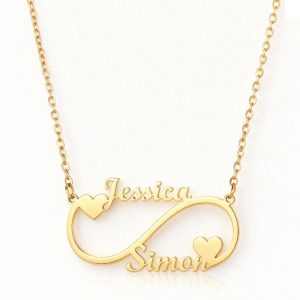 Open heart infinity pendant necklace with single-line engraving and tiny birthstone accent on a stainless steel O-link chain