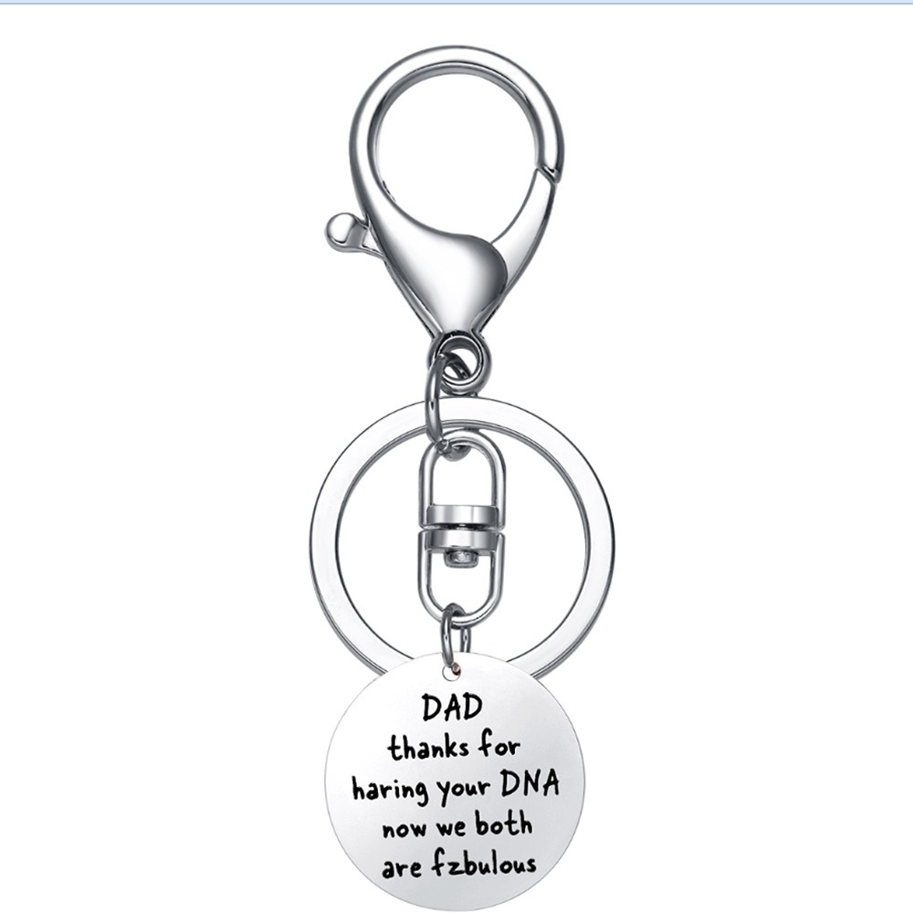Stainless steel dad keychain with engraved name and a single birthstone charm