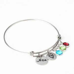 Stainless steel bracelet engraved with a name and set with a single birthstone