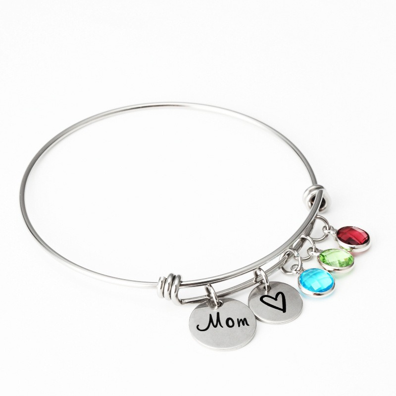 Stainless steel bracelet engraved with a name and set with a single birthstone
