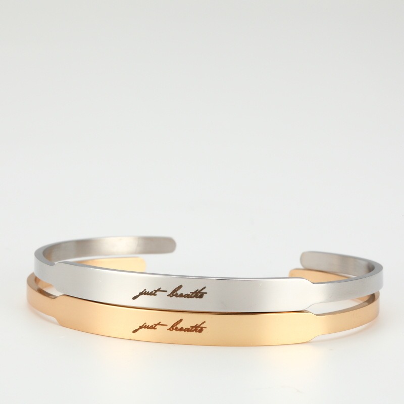 Stainless steel C-shape cuff bracelet with custom engraving and a birthstone accent