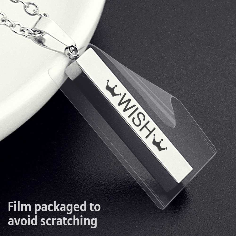 Vertical stainless steel bar necklace with custom single line engraving and optional birthstone, shown in gold tone