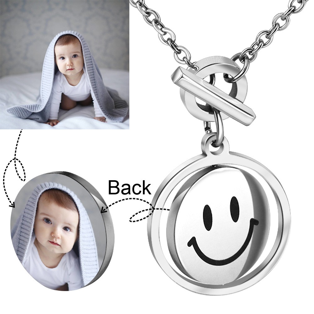 Rotating smile pendant necklace with a photo print