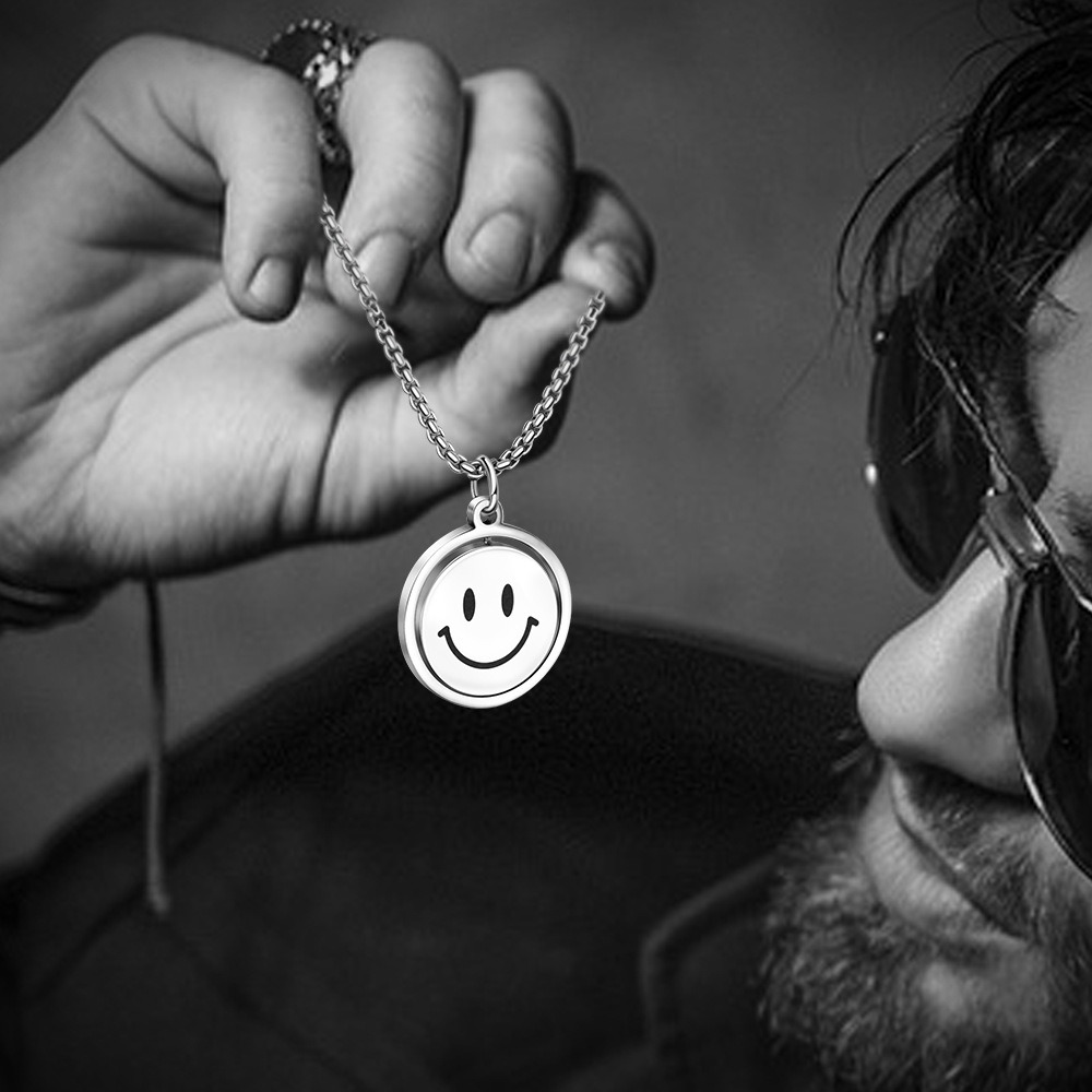 Rotating smile pendant necklace with a photo print