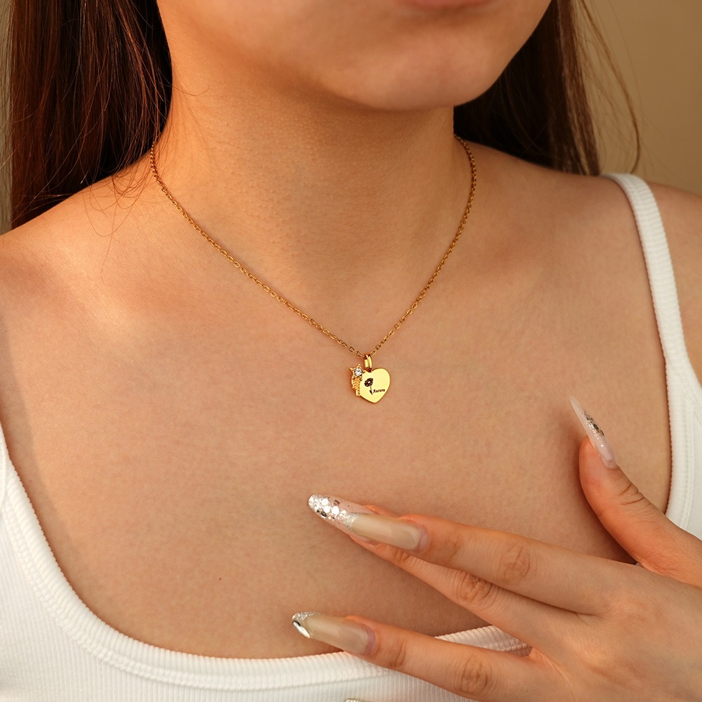 Stainless steel name necklace with a cubic zirconia birthstone flower pendant