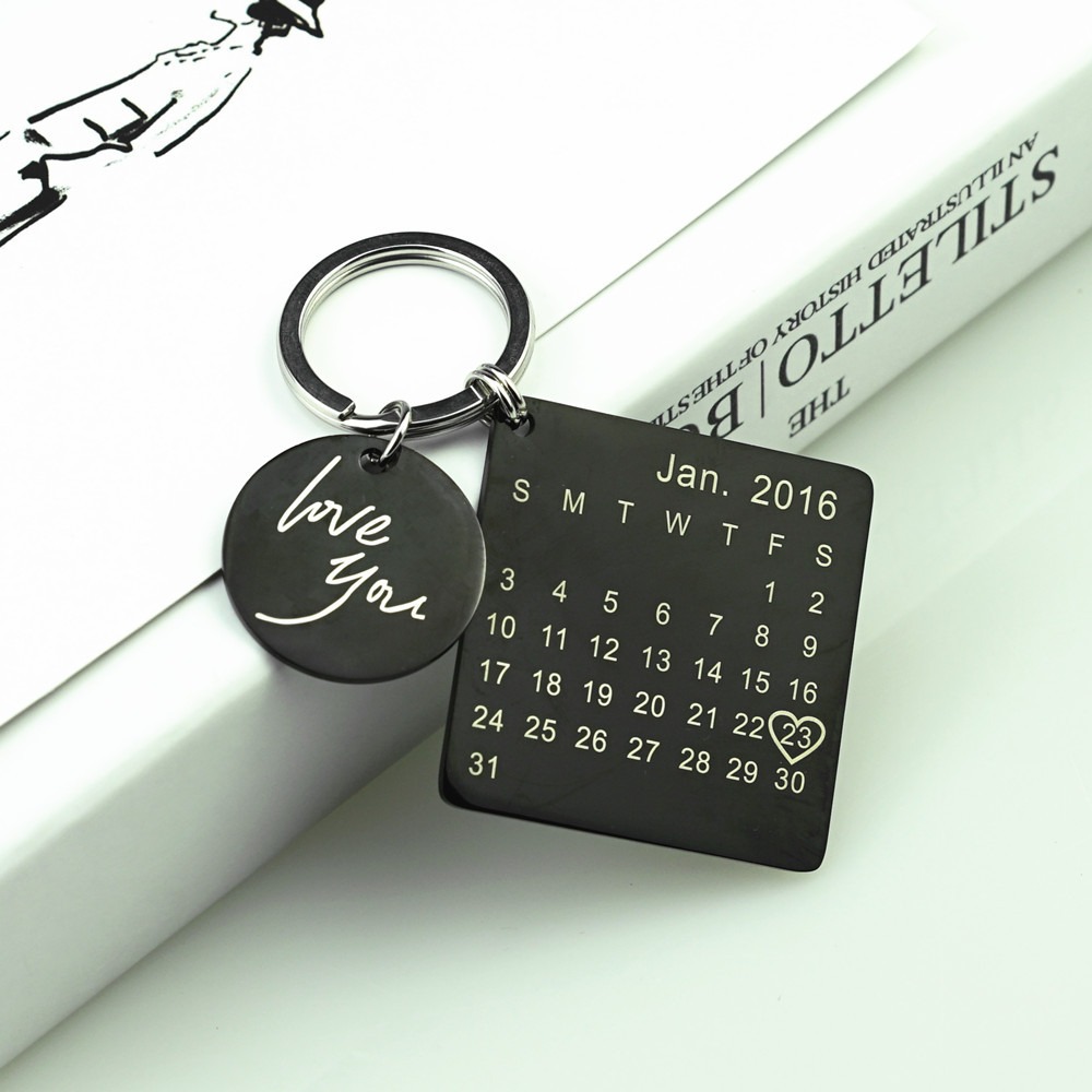 Engraved stainless steel keychain with a birthstone and a heart accent