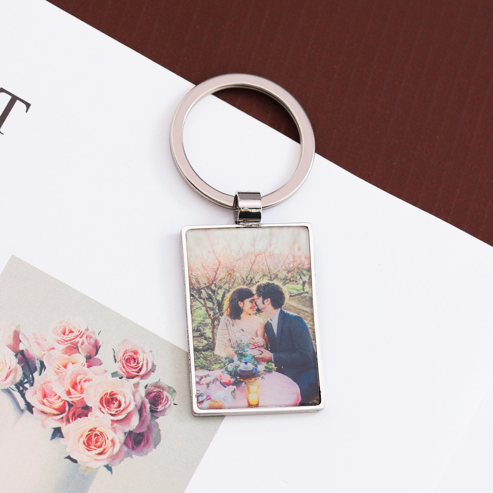 Stainless steel dog tag keyring with a message and photos on two sides