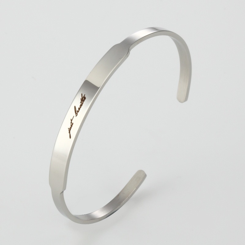 Stainless steel C-shape cuff bracelet with custom engraving and a birthstone accent