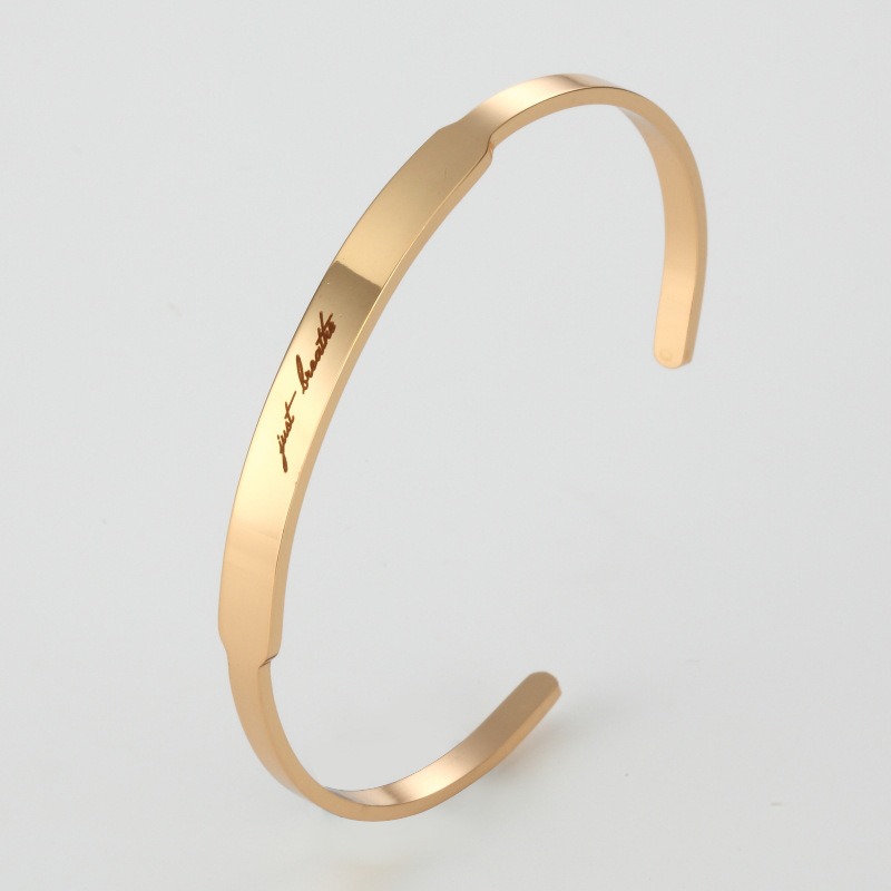 Stainless steel C-shape cuff bracelet with custom engraving and a birthstone accent
