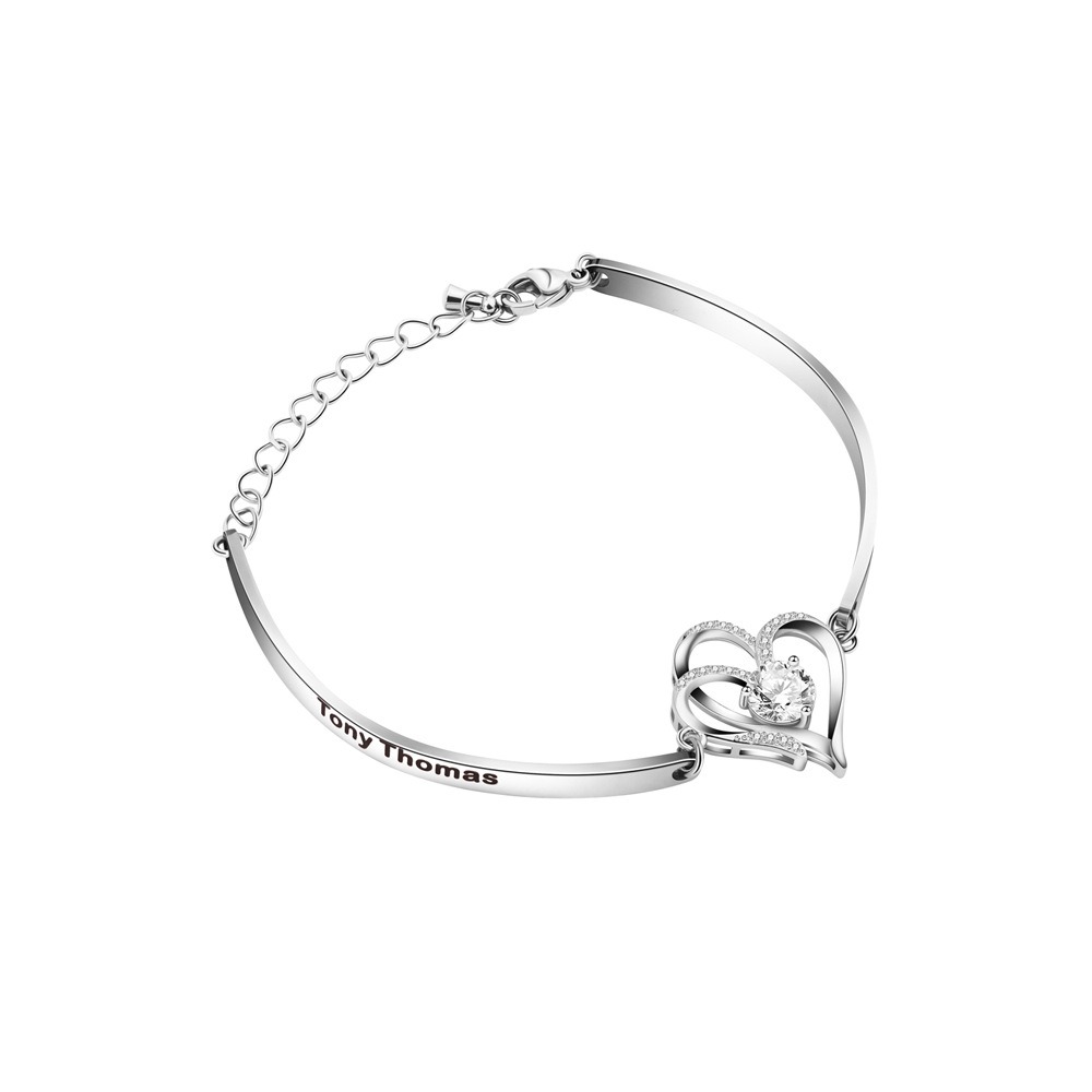 Stainless steel bracelet with two CZ heart charms engraved with names and birthstones — Silver Tone