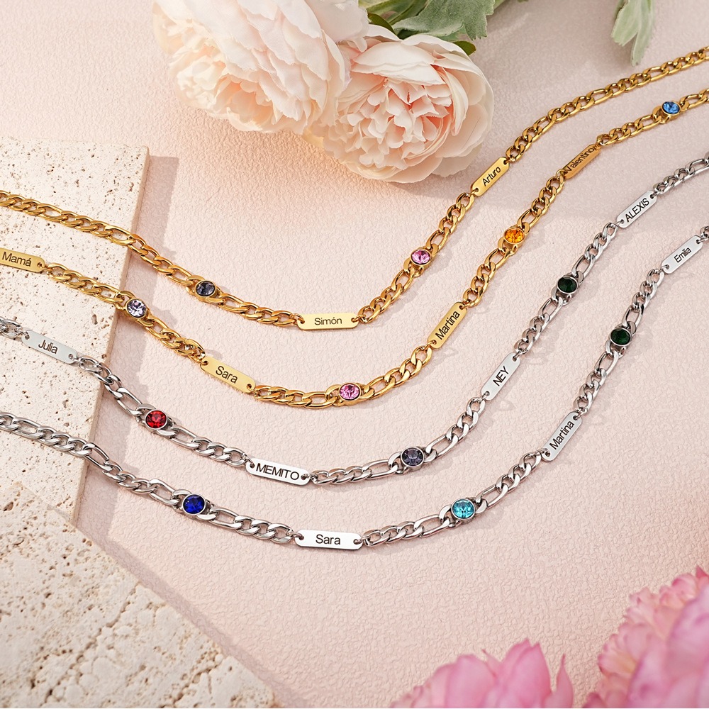 Stainless steel Cuban link necklace with a custom engraved name bar and a single birthstone charm