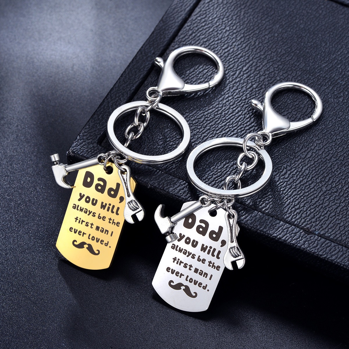 Stainless steel dad keychain with engraved name and a single birthstone charm
