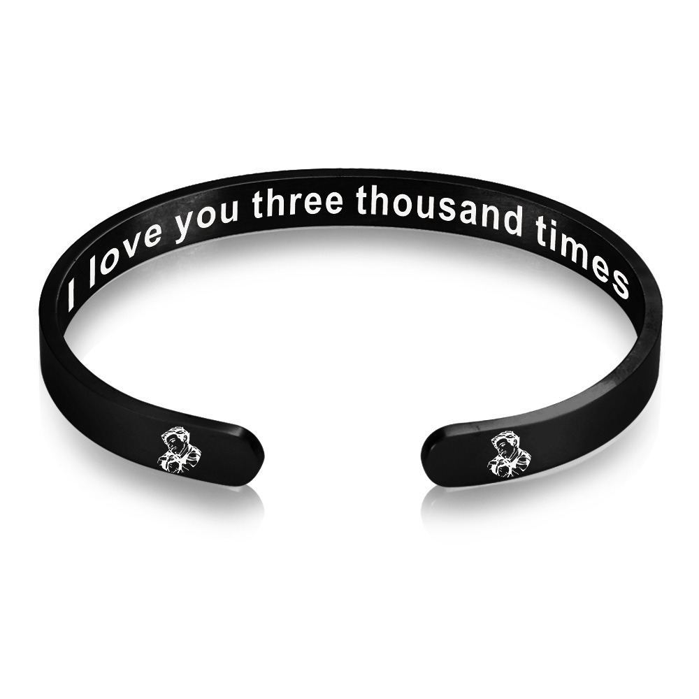 Stainless steel open cuff bracelet engraved with a name and a single birthstone