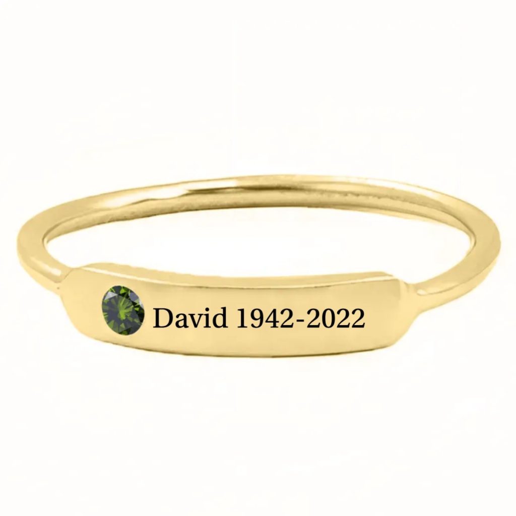 Minimalist stainless steel ring with cubic zirconia accent and one line of engraving