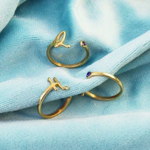 Adjustable gold initial ring with diamond accent