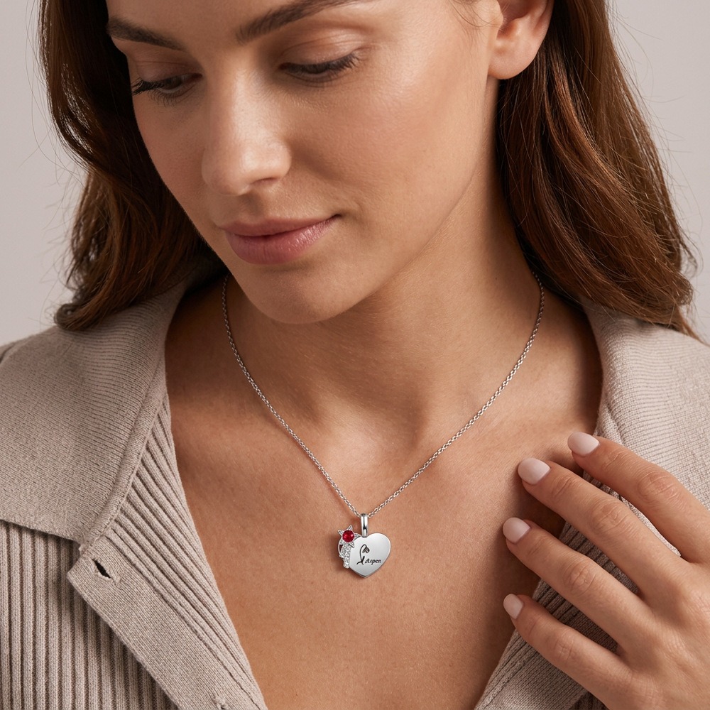 Stainless steel name necklace with a cubic zirconia birthstone flower pendant